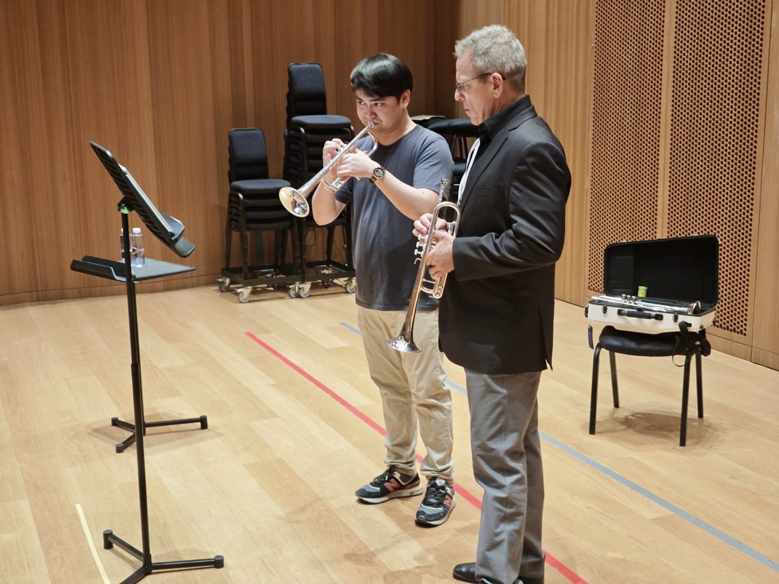 Jon Paul Dante coaching a student in an orchestral trumpet lesson