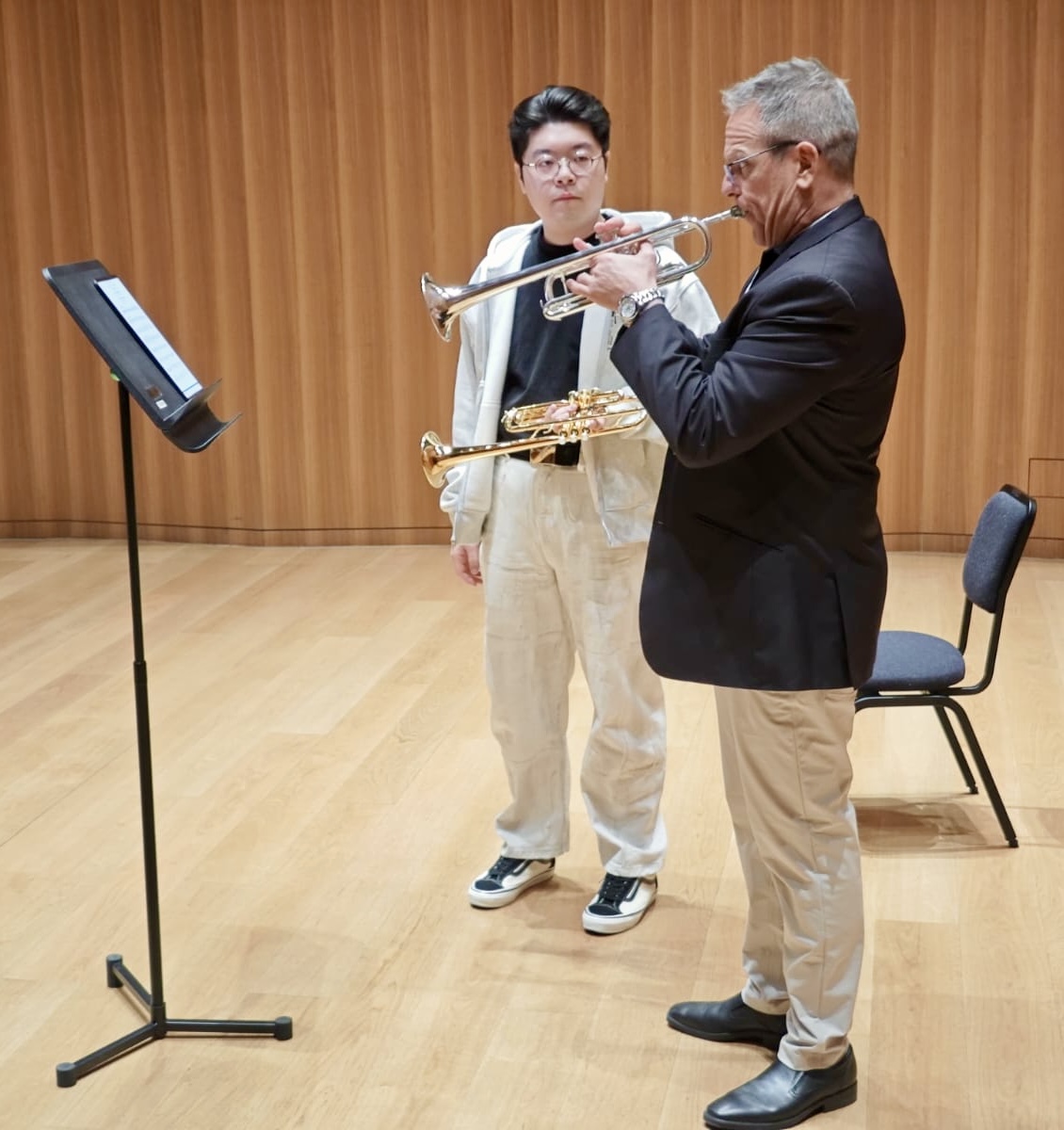 Jon Paul Dante performing for a student